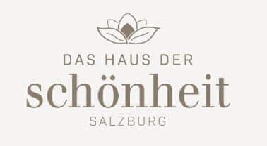 meinkarrierestart.at Logo mit Lotusblütengrafik über dem Text „DAS HAUS DER schönheit SALZBURG“ in klarer, eleganter Schriftart.