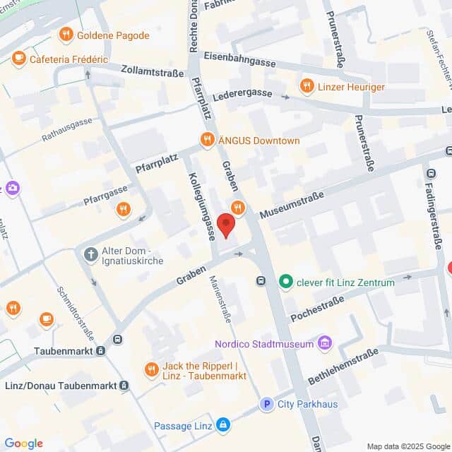 meinkarrierestart.at Eine digitale Karte mit Straßen, Geschäften und Sehenswürdigkeiten im Zentrum von Linz, Österreich, mit einer roten Stecknadel in der Nähe von Graben und Museumstraße.